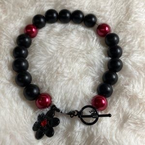 Black and Red Glass Pearl Bracelet With Flower Charm